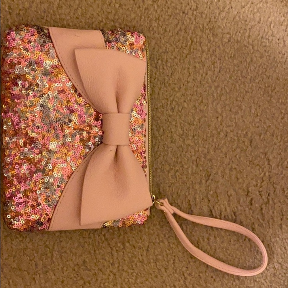 A Betsy Johnson wristlet